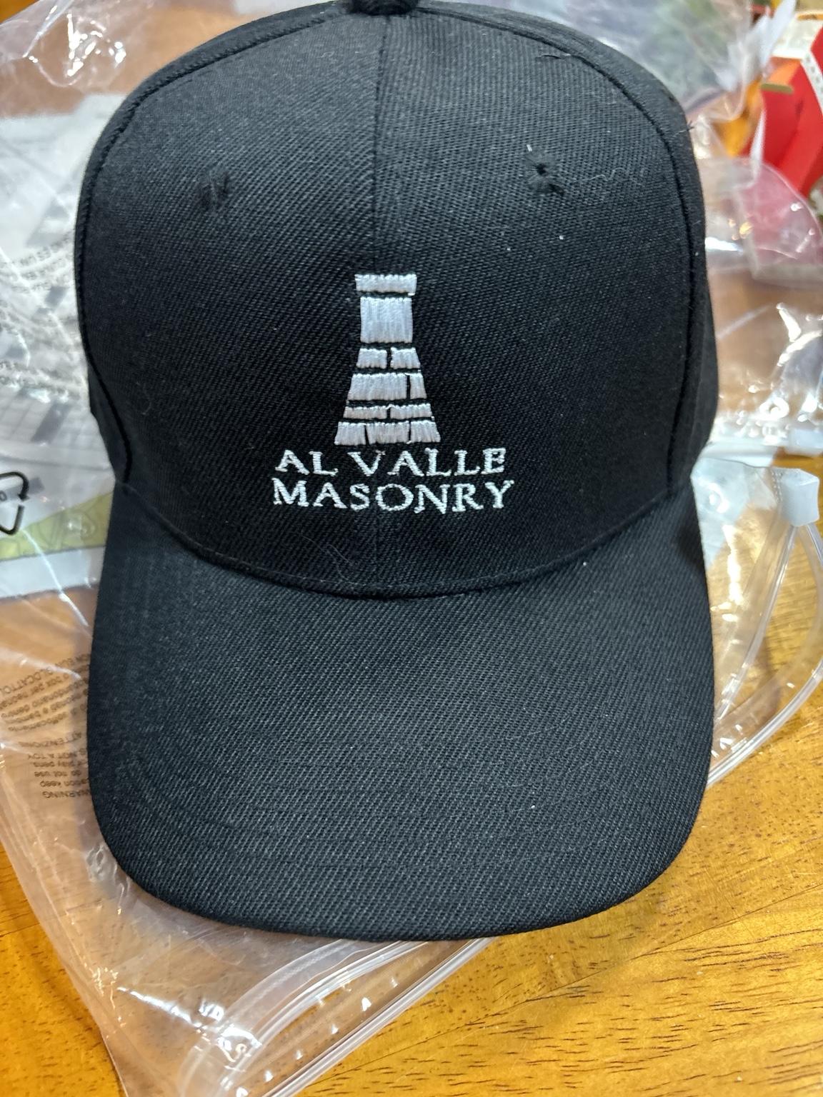 Colorful embroidered event logo on staff apparel
